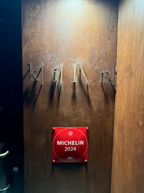 the exterior sign with a michelin star sign